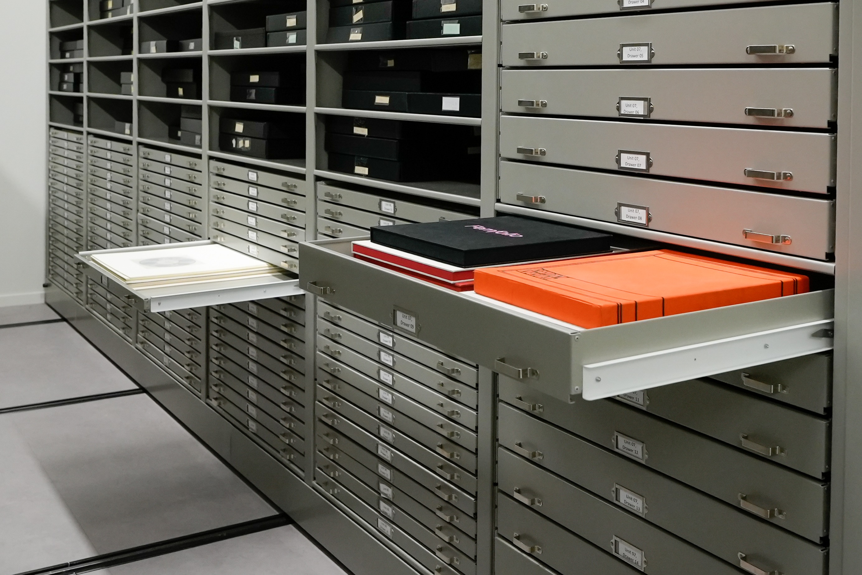 Man walking down ActivRAC Mobile Pallet Racking Warehouse Storage Aisle