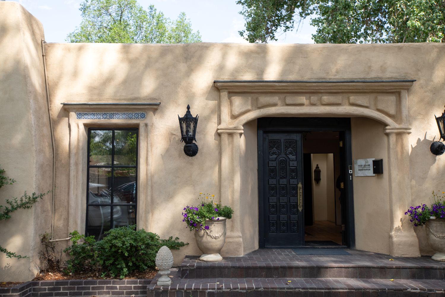 Dining room of Palacio with long table and chairs and fireplace