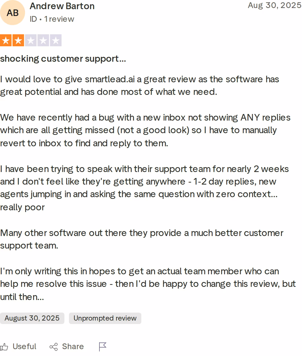 Smartlead 2-star Trustpilot review by Andrew Barton citing a reply-sync bug and two-week support delay