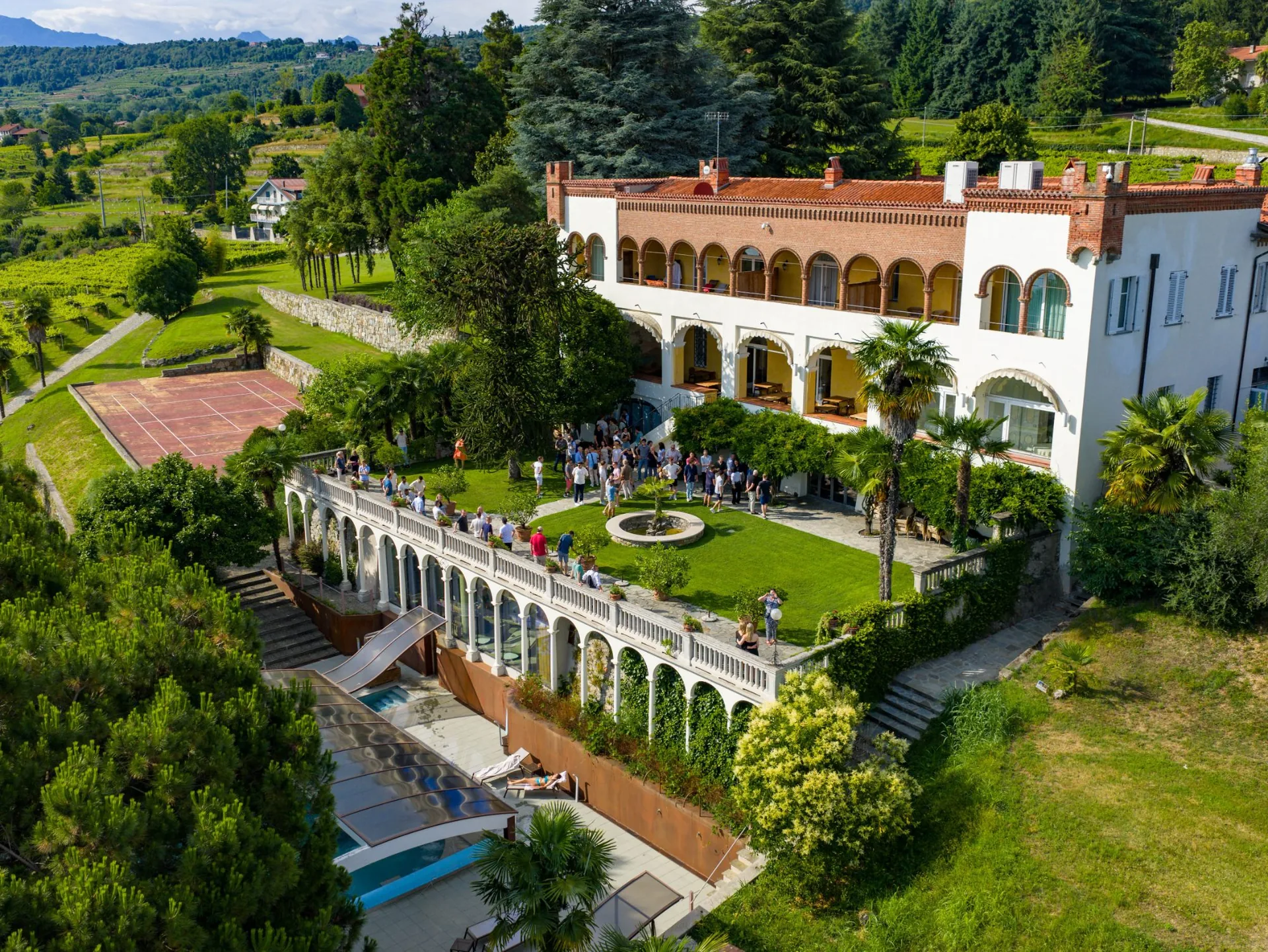 A historic arched villa with vineyards and a pool, a vetted venue
