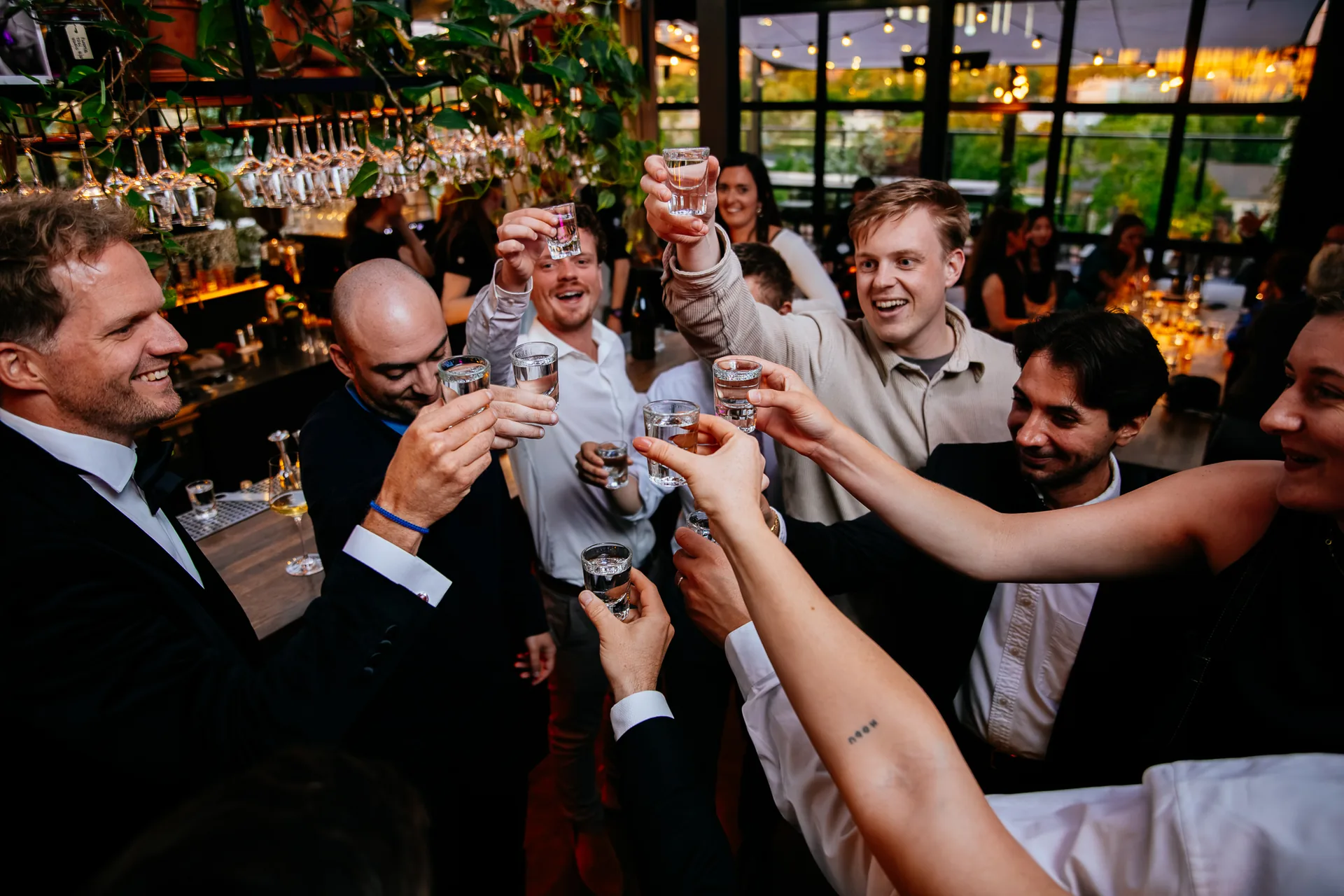 ParkBee colleagues raising a toast together at the closing celebration