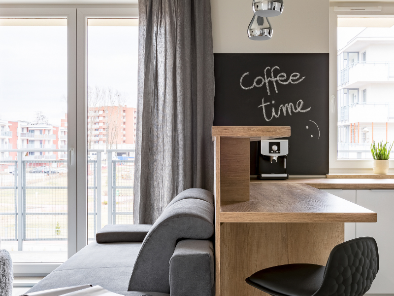 living room and office room in one