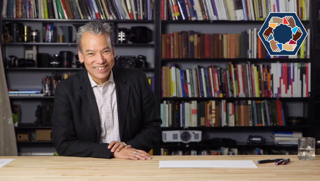 Robert Lue in a library