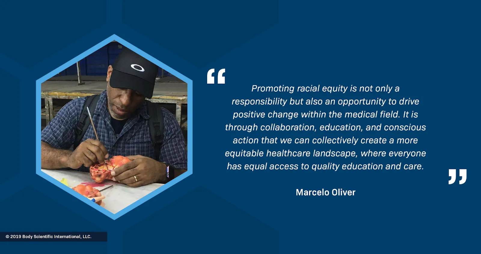 Marcelo Oliver, a Black man wearing a black cap, painting a plastic model of an anatomical heart. Text reads: Promoting racial equity is not only a responsibility but also an opportunity to drive positive change within the medical field. It is through collaboration, education, and conscious action that we can collectively create a more equitable healthcare landscape, where everyone has equal access to quality education and care. The photo is credited to Body Scientific International, LLC, 2019.