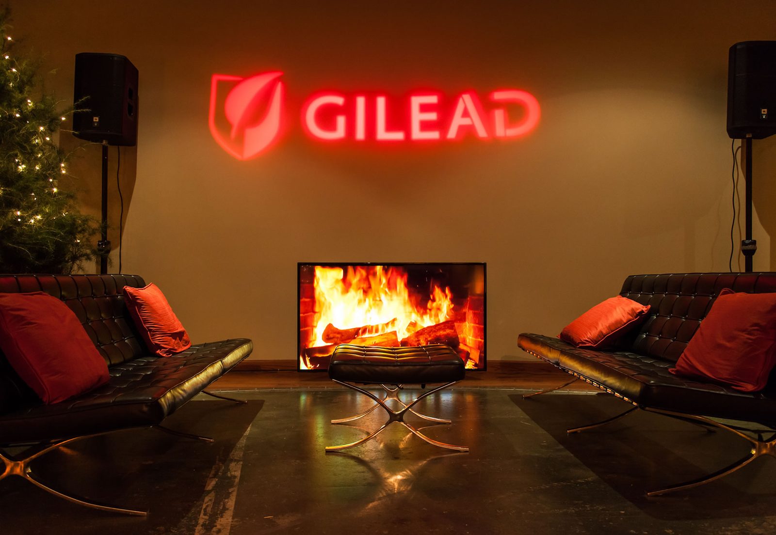Branded activation lounge with screen by Impact