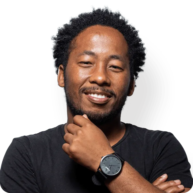 Man smiling with hand to chin
