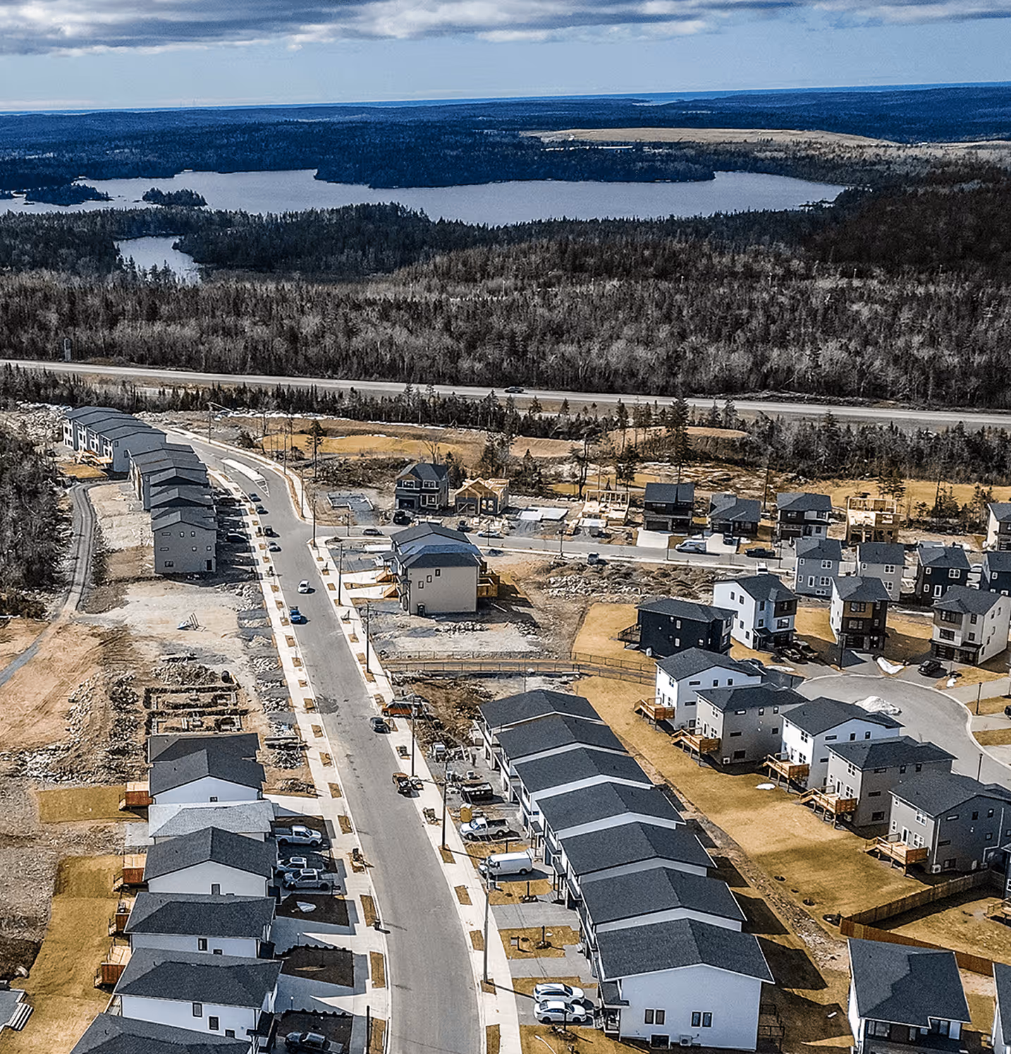 Bird's eye view of Halifax ADU community development showing planned secondary suite neighborhood with multiple modern homes and strategic property layout