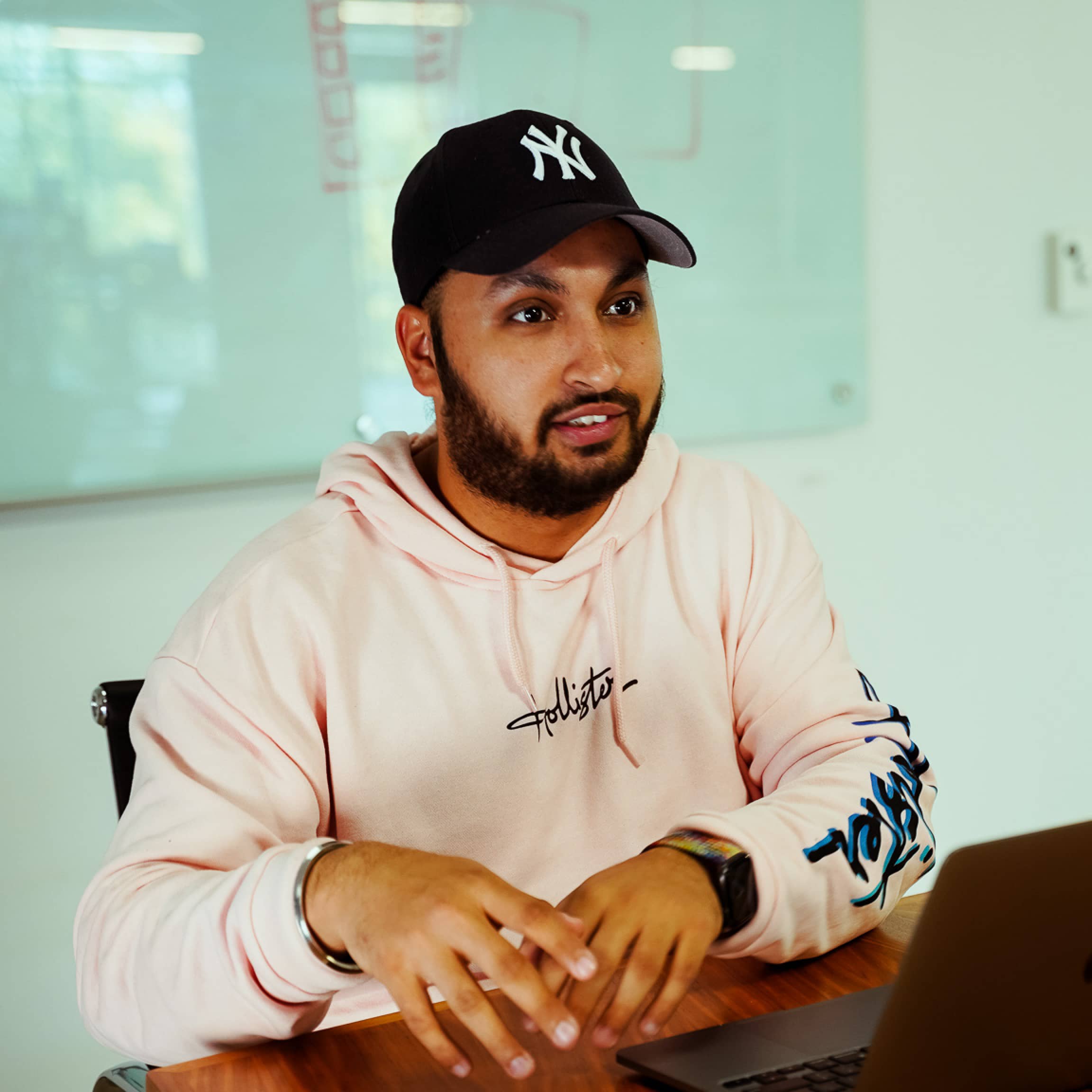 product designer at headway talking in meeting about design systems