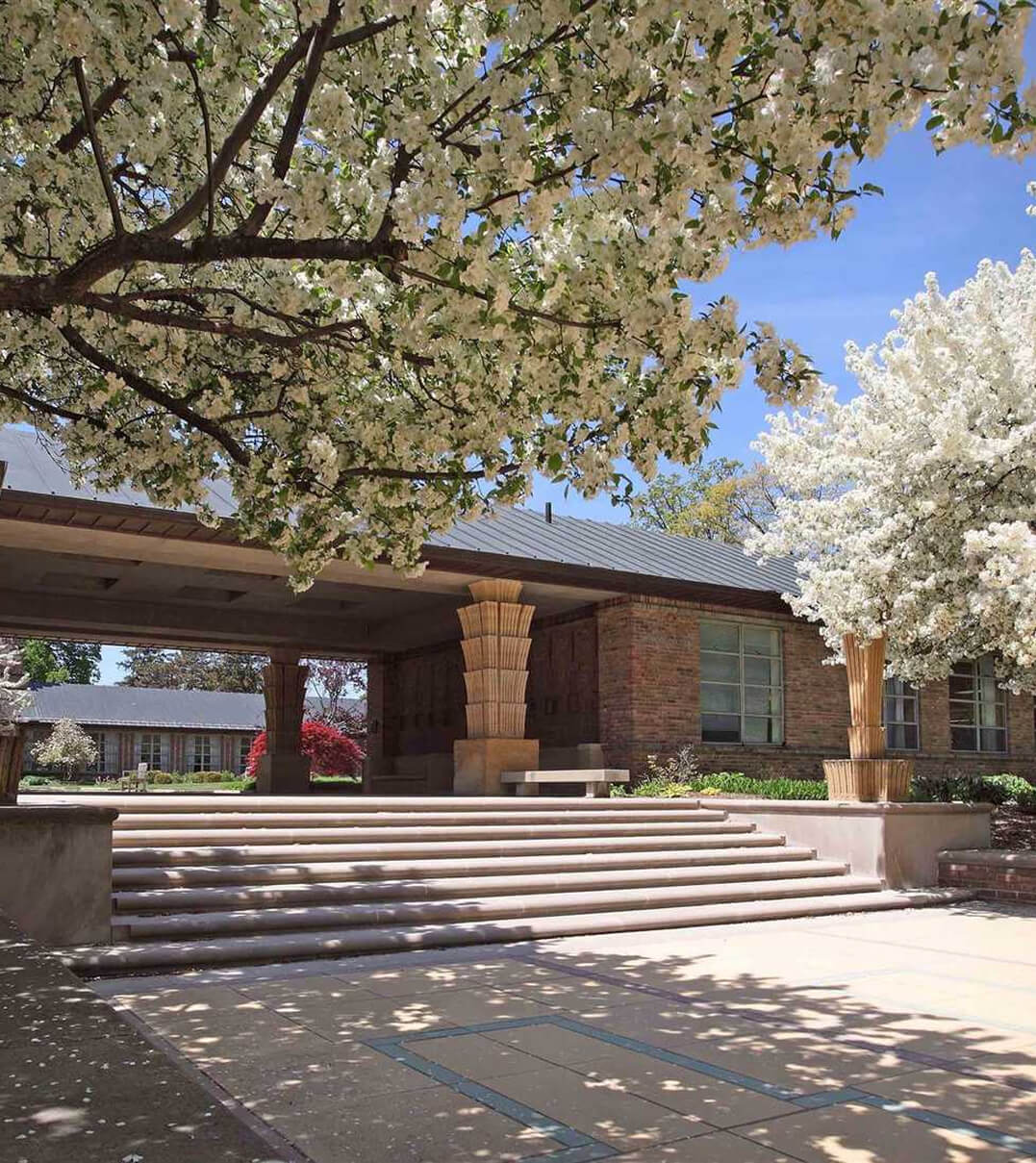 Cranbrook Schools campus with flowering trees.