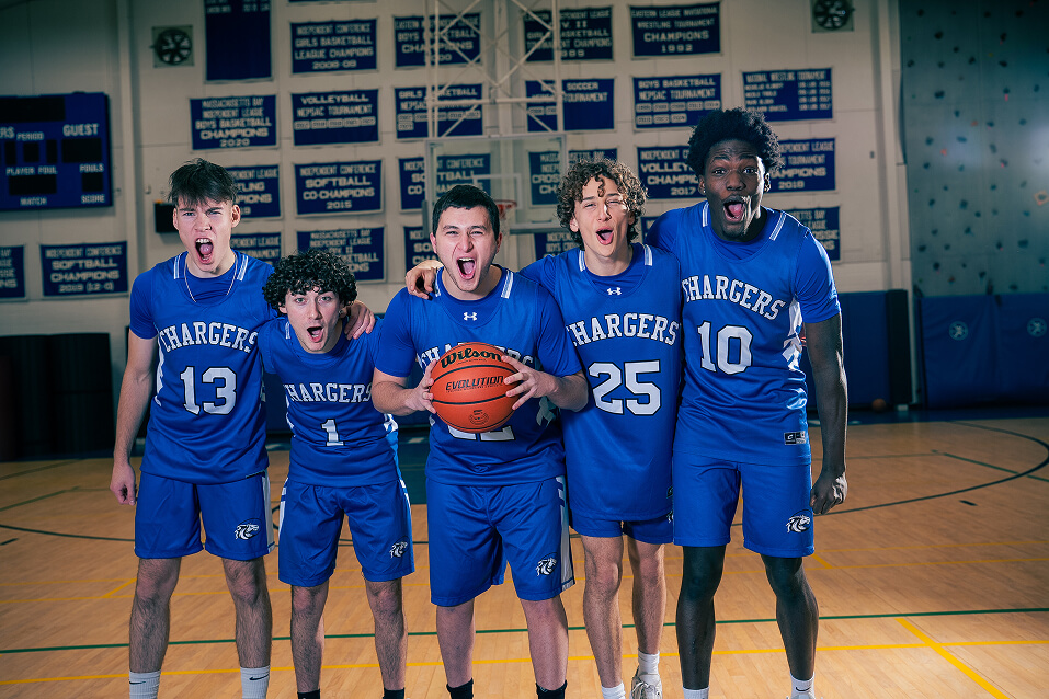 Chapel Hill-Chauncy Hall male basketball players in uniform show their game face.