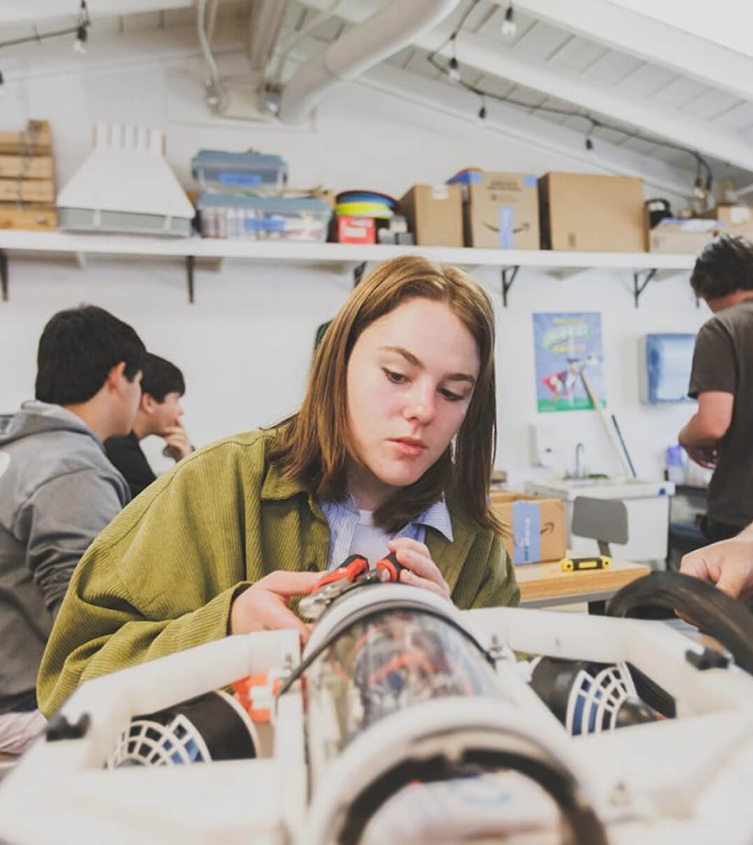 A Stevenson School student working on a mechanical project.
