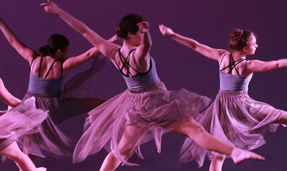 Thornton Academy ballet dancers on stage during a performance.