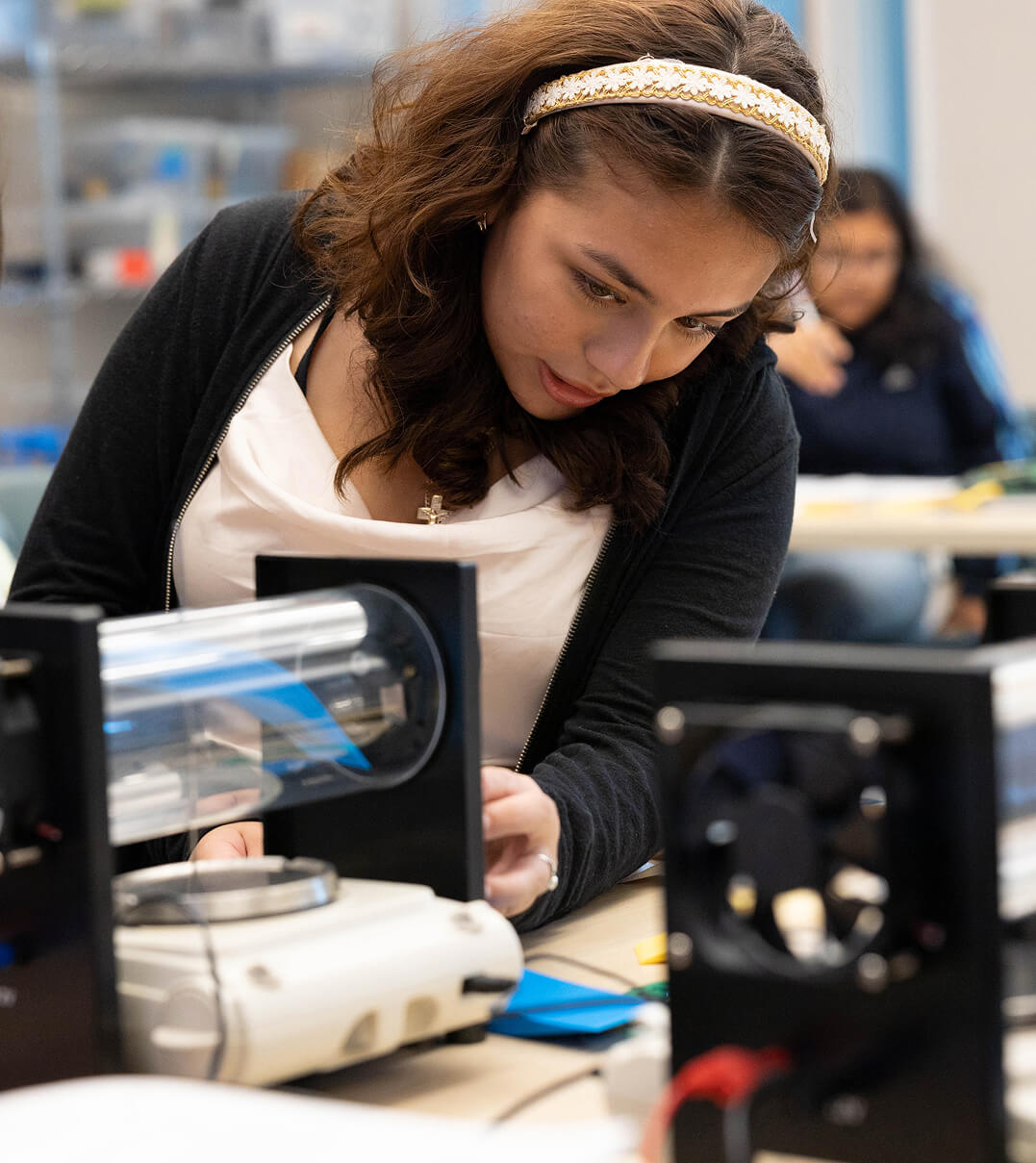 A Miss Hall's School student conducting a high-tech experiment.