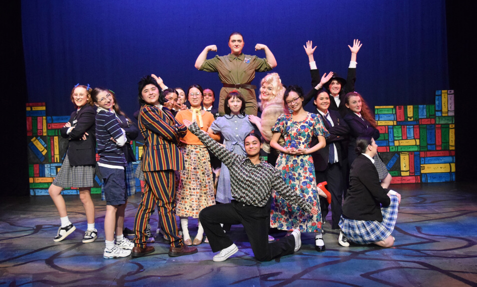 Miss Hall's School drama students in a closing scene of Matilda.