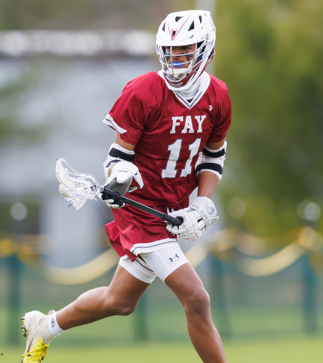 A Fay lacrosse player making a run.