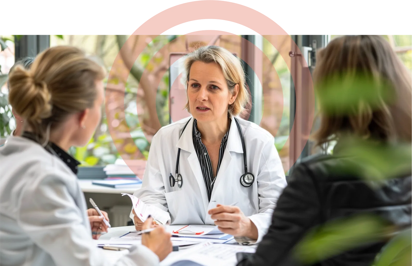 Physicians review a case together