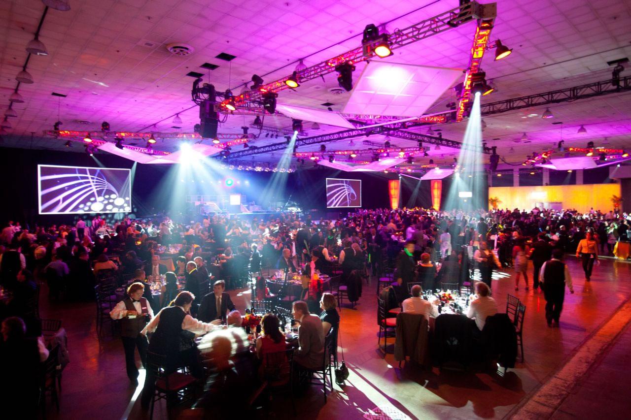 Anniversary keynote with moving lights over a full house