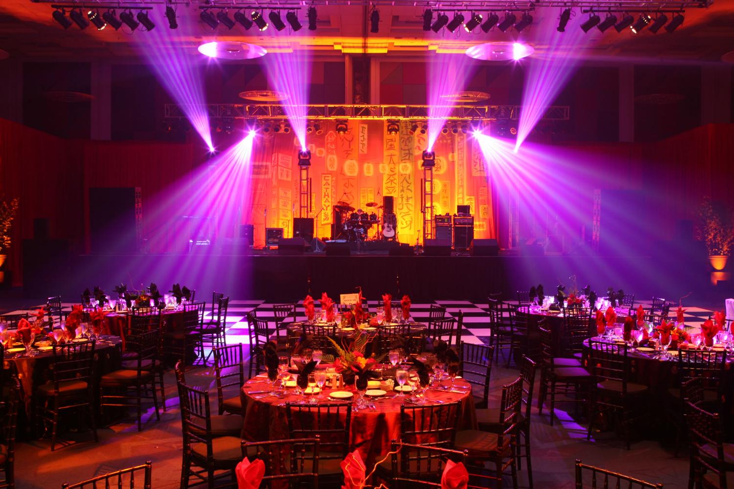 Gala dinner under saturated magenta beams