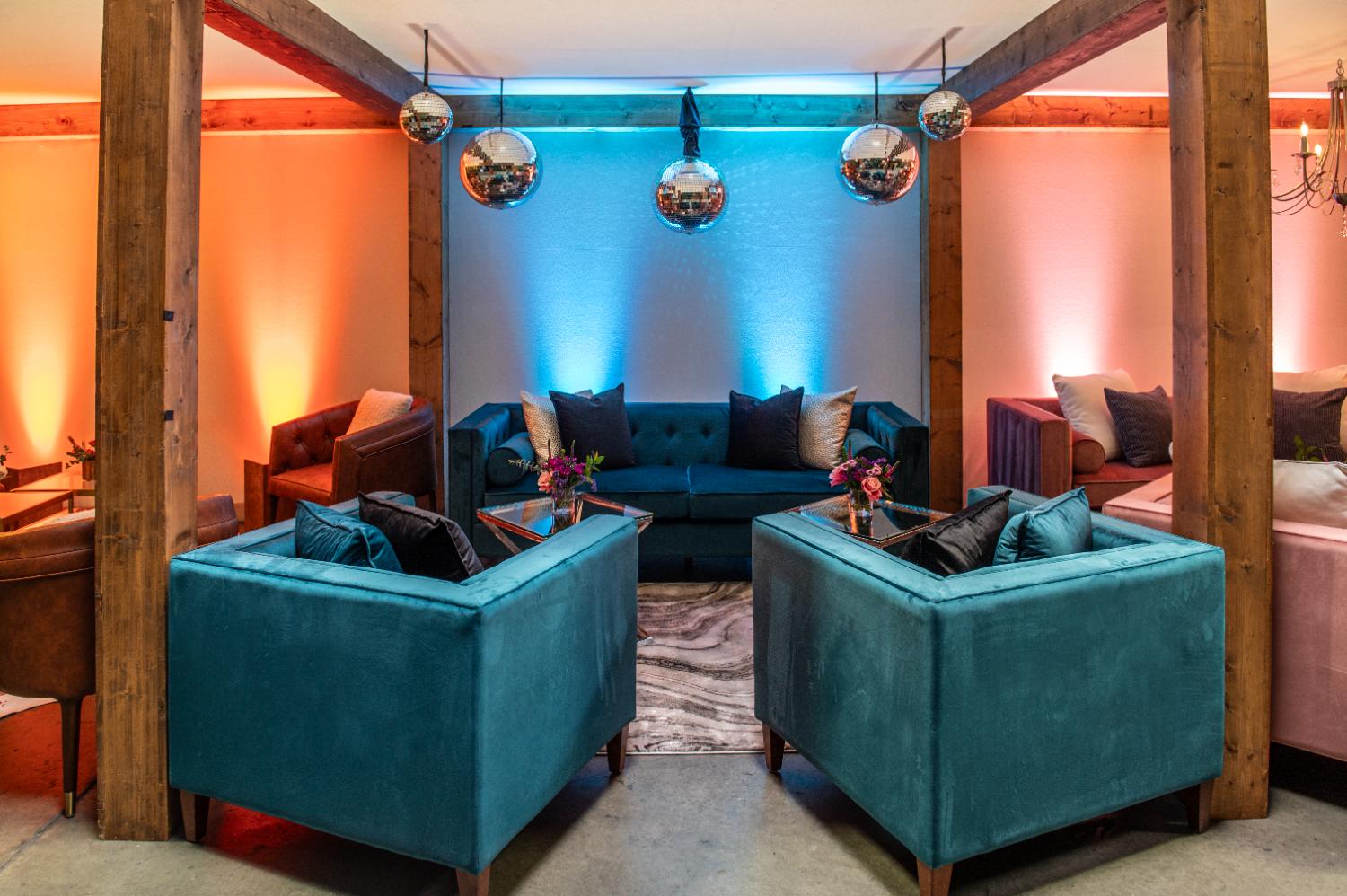 Custom lounge vignette in teal and amber uplight