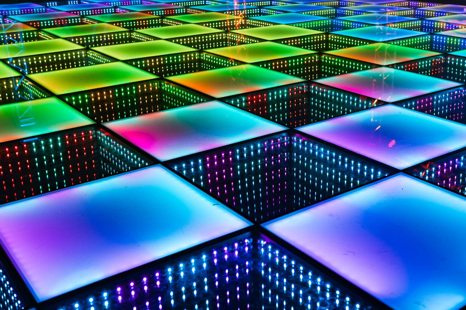 Infinity LED dance floor glowing in full color
