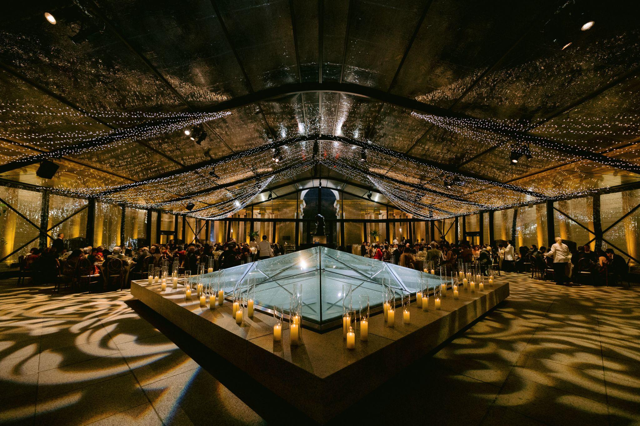 Uplighting and pin spots highlighting decor at an Impact event