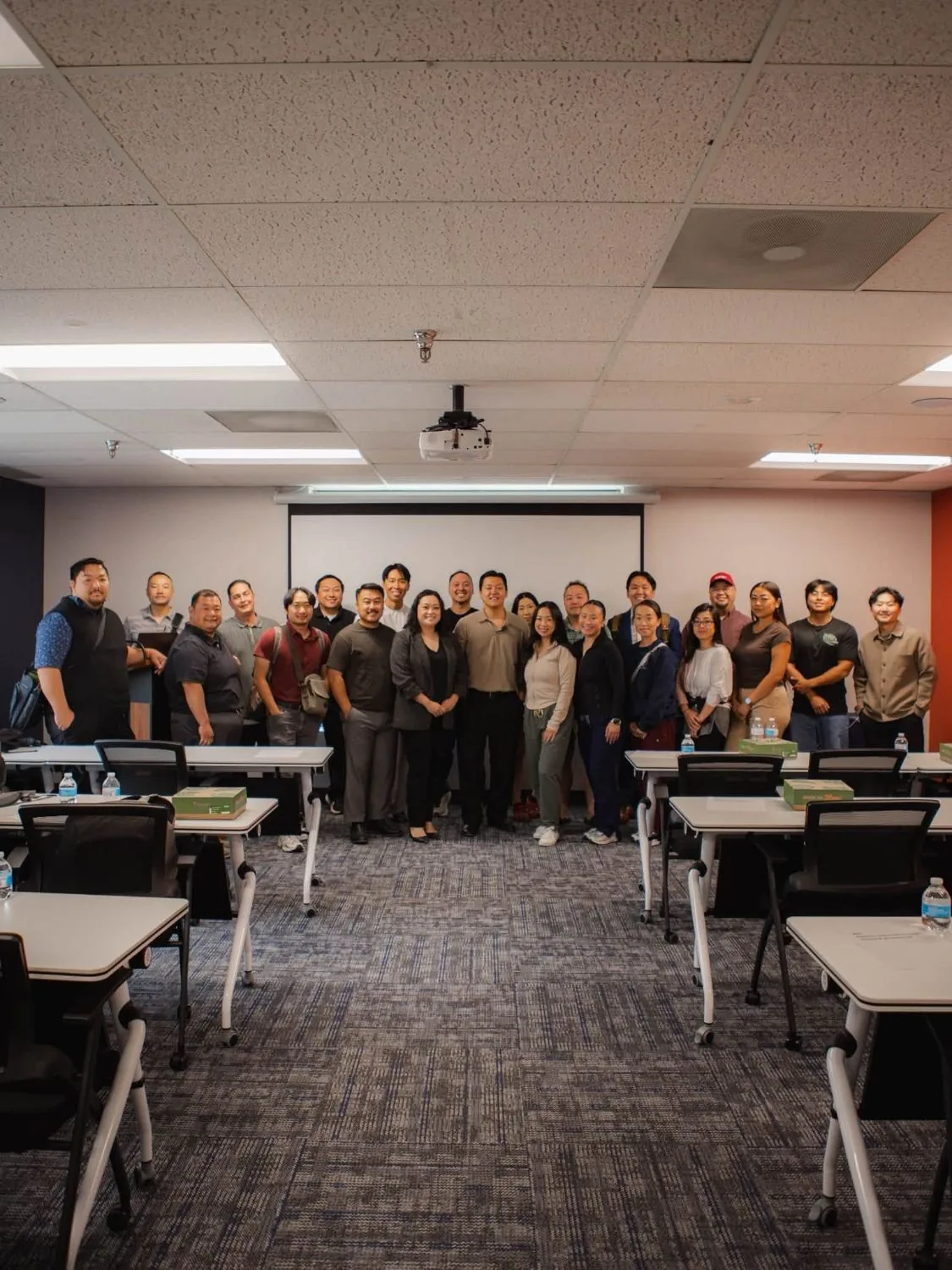 Group photo of a Pure Growth marketing workshop cohort with Christian Yang