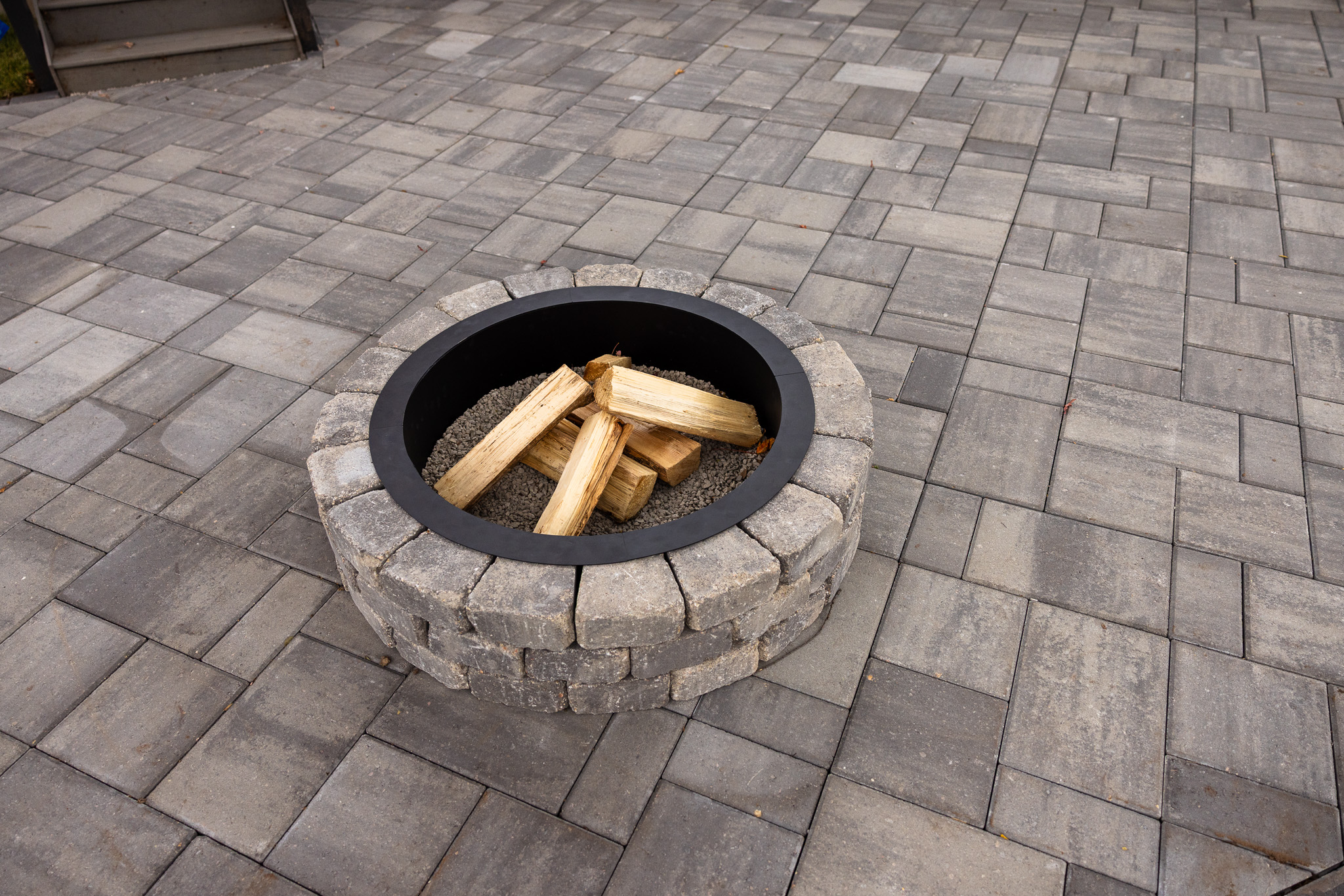 Solid, well-designed retaining wall as part of a hardscape project by Murillo's Landscaping