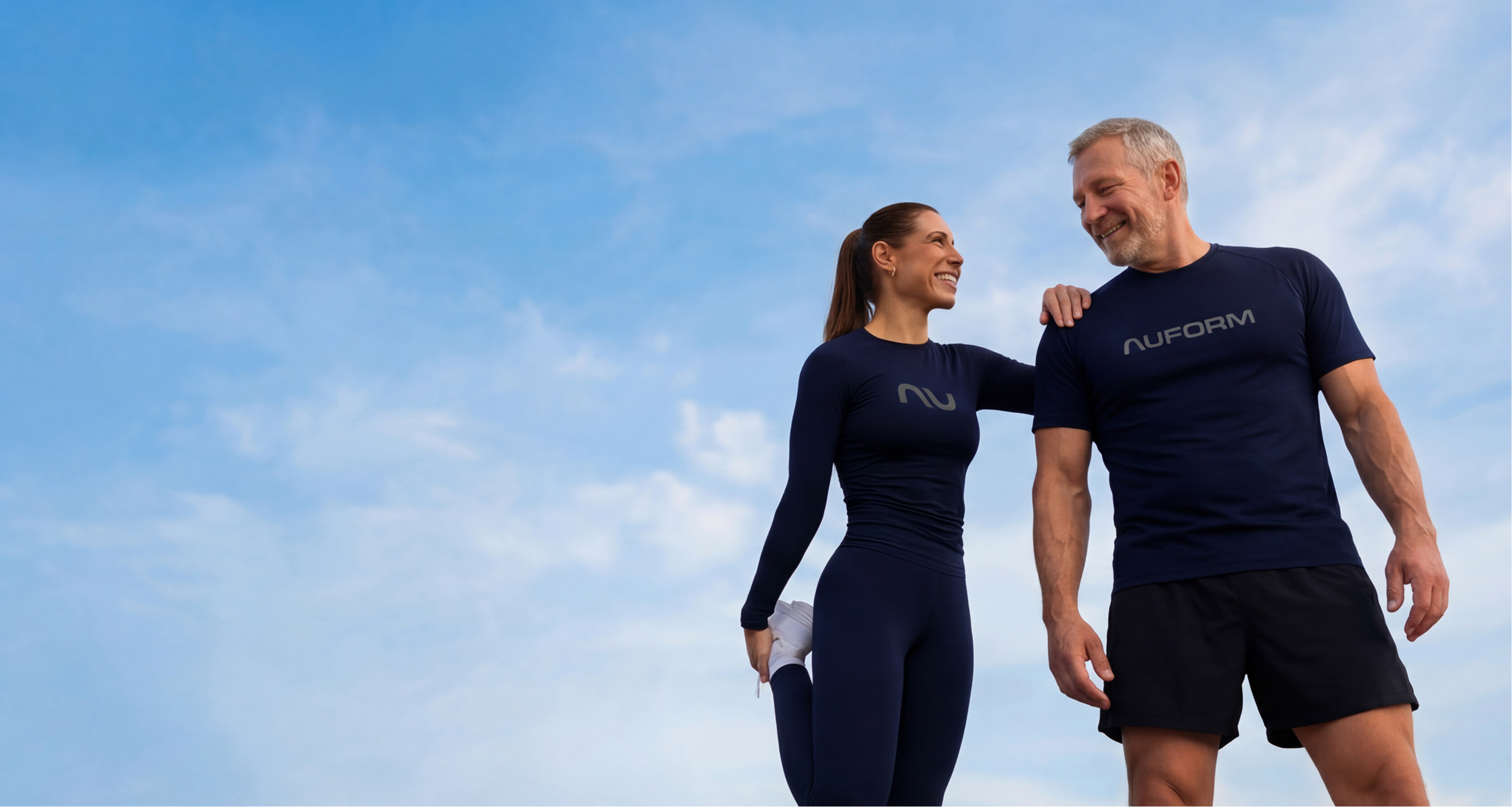 Man and woman outdoors, active and healthy