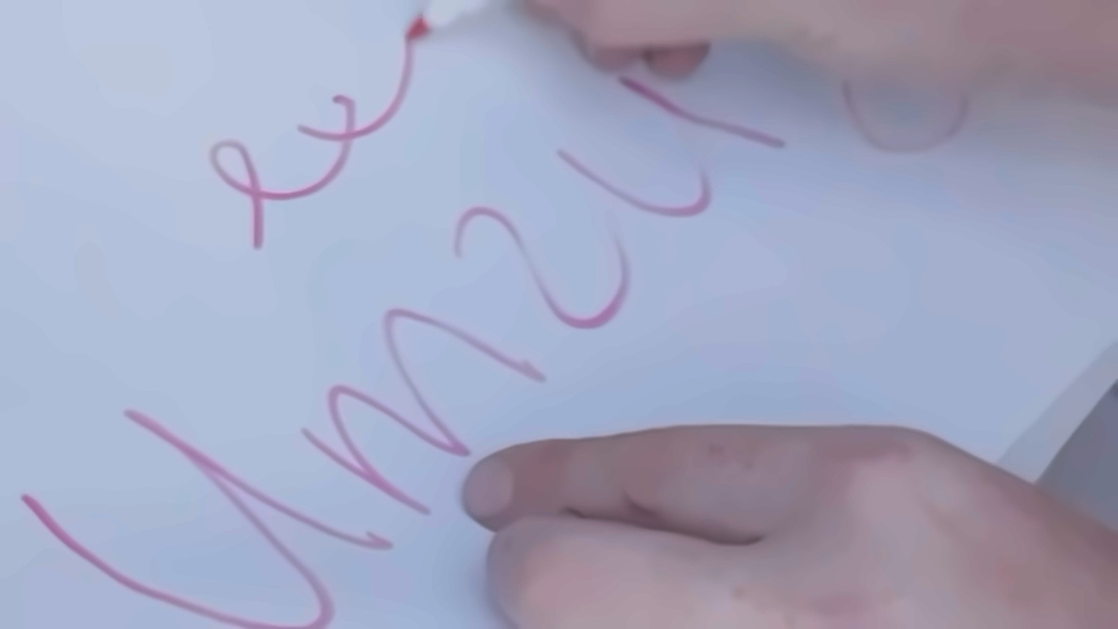 Hand schreibt Umzug mit rotem Marker