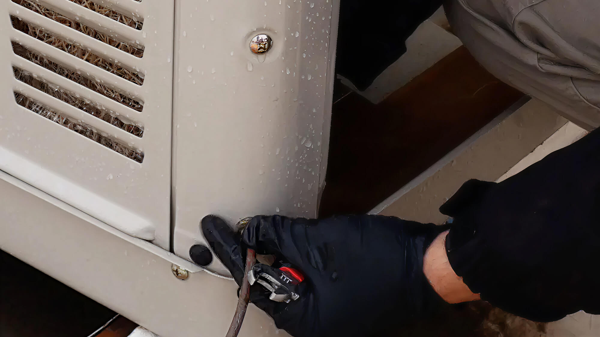 swamp cooler being serviced