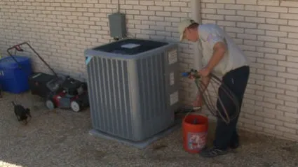 air conditioner being repair 