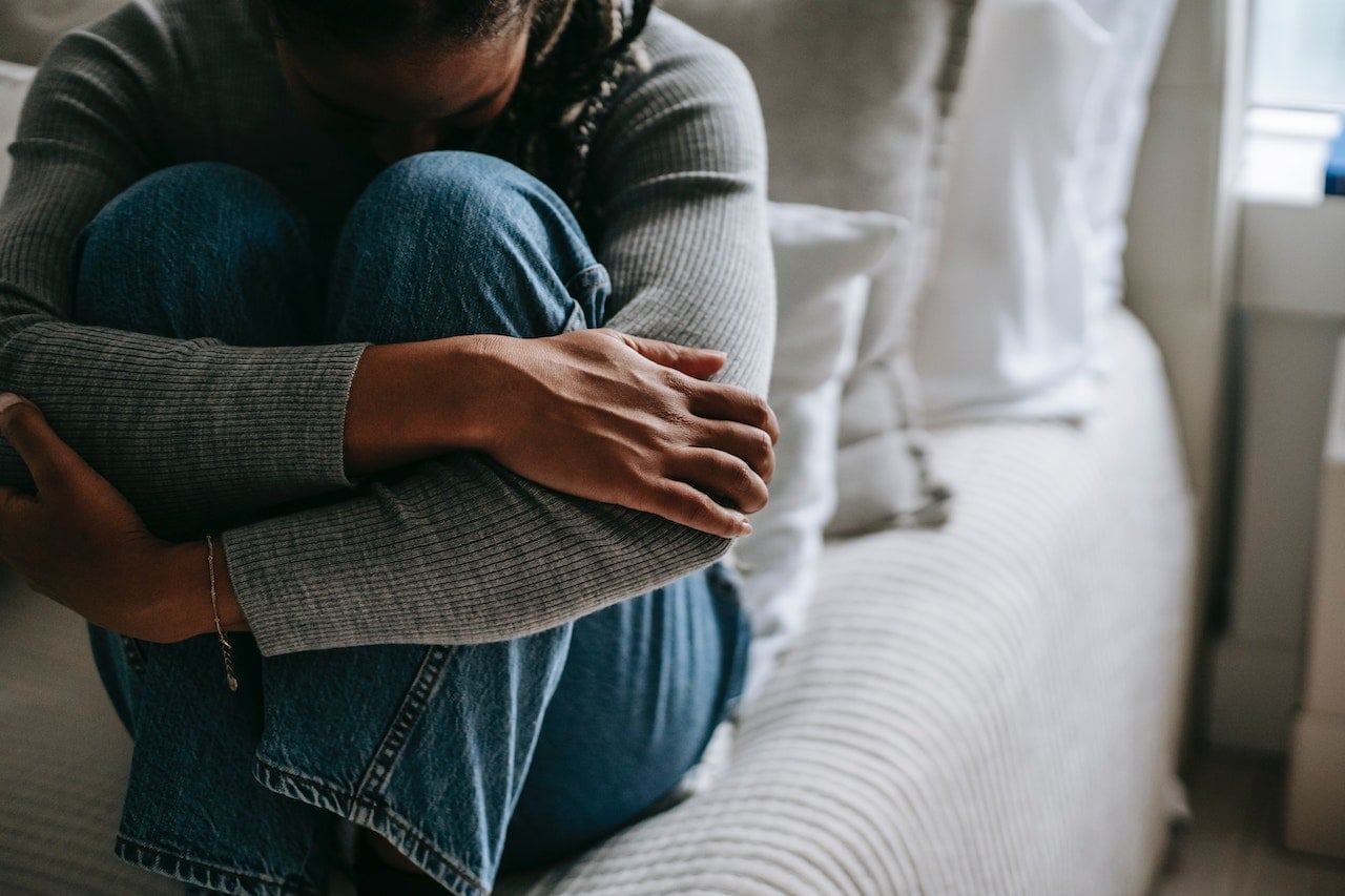 sad-person-hugging-their-knees