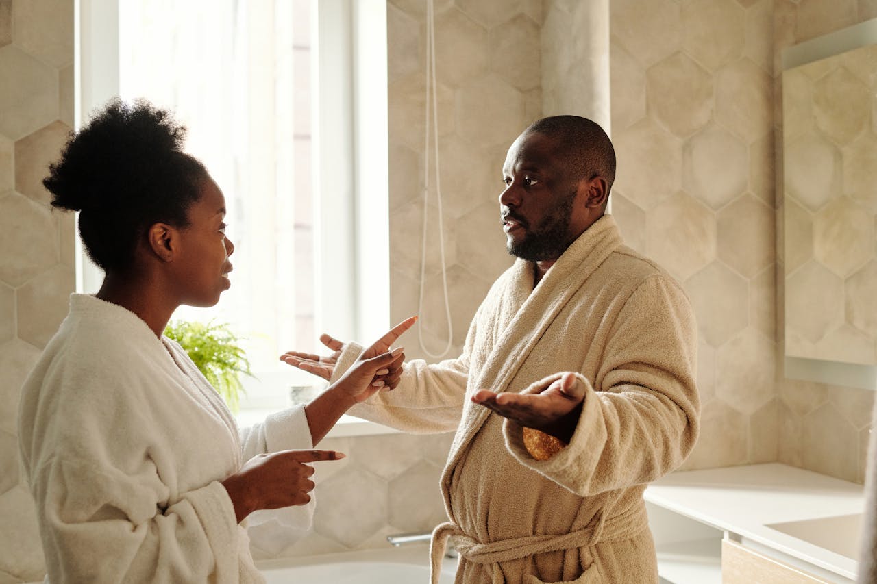 couple in bathroom arguing