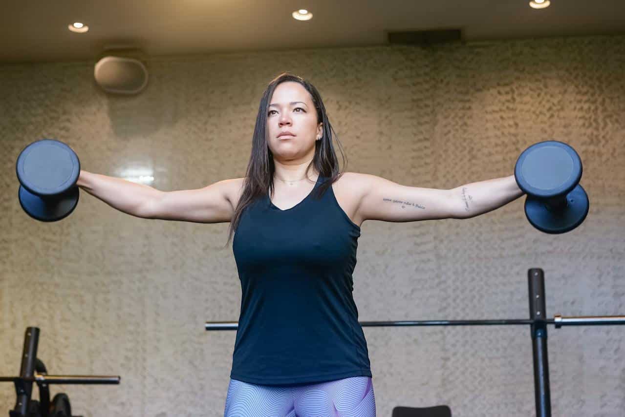 woman-working-out-with-arm-weights
