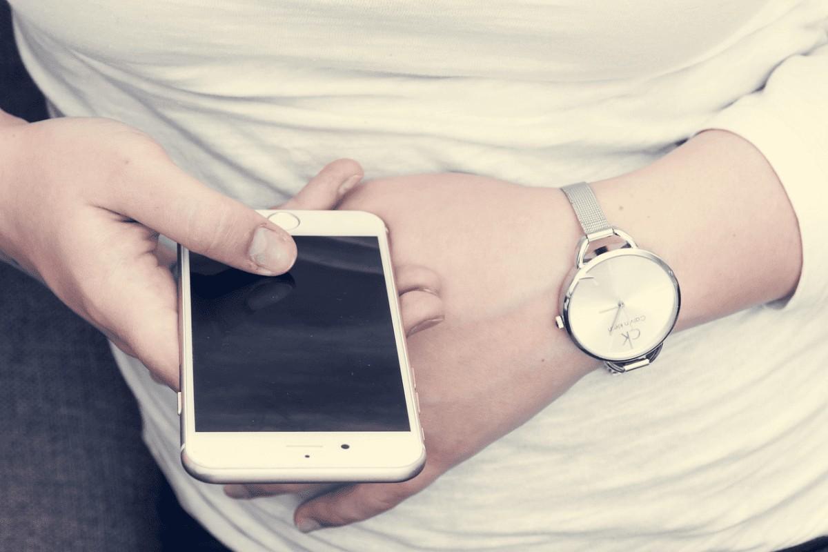 Hands holding a smartphone