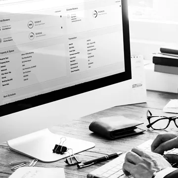 Man working on computer using Buildout's Manage & Close software
