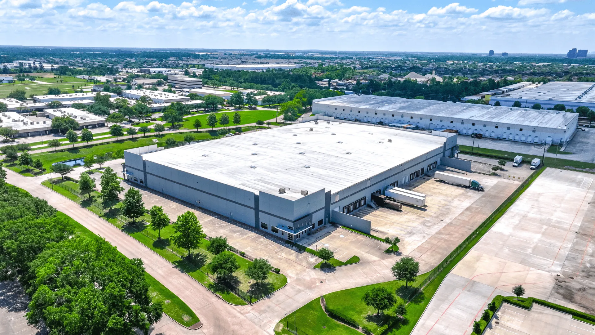 Exterior drone shot of an industrial space