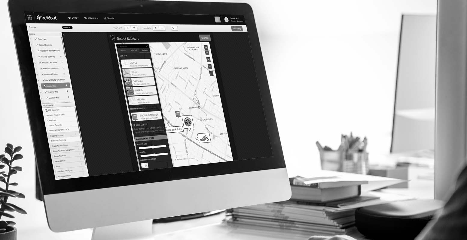 Person sitting at computer editing a Buildout Showcase Retailer Map