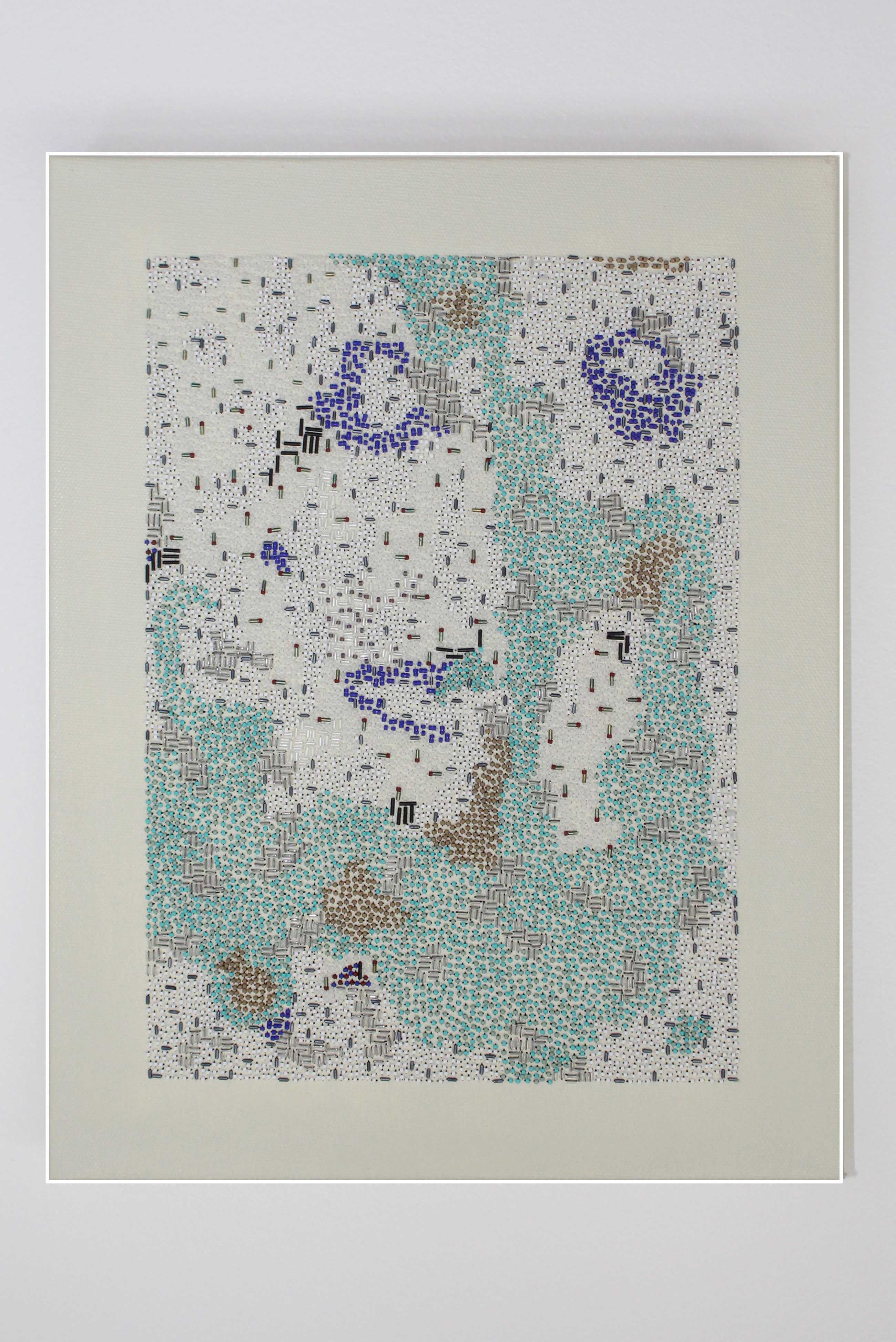 A painted beaded canvas by Adrienne Colenburg.