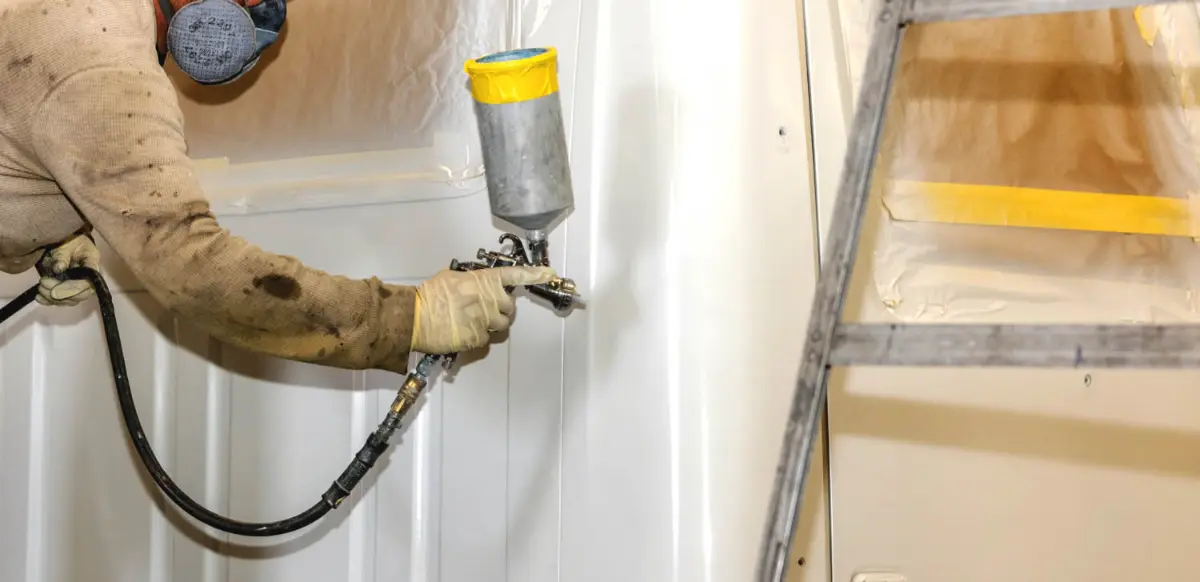 Truck mechanic performing collision repairs on semi truck in Bedford Park, Illinois