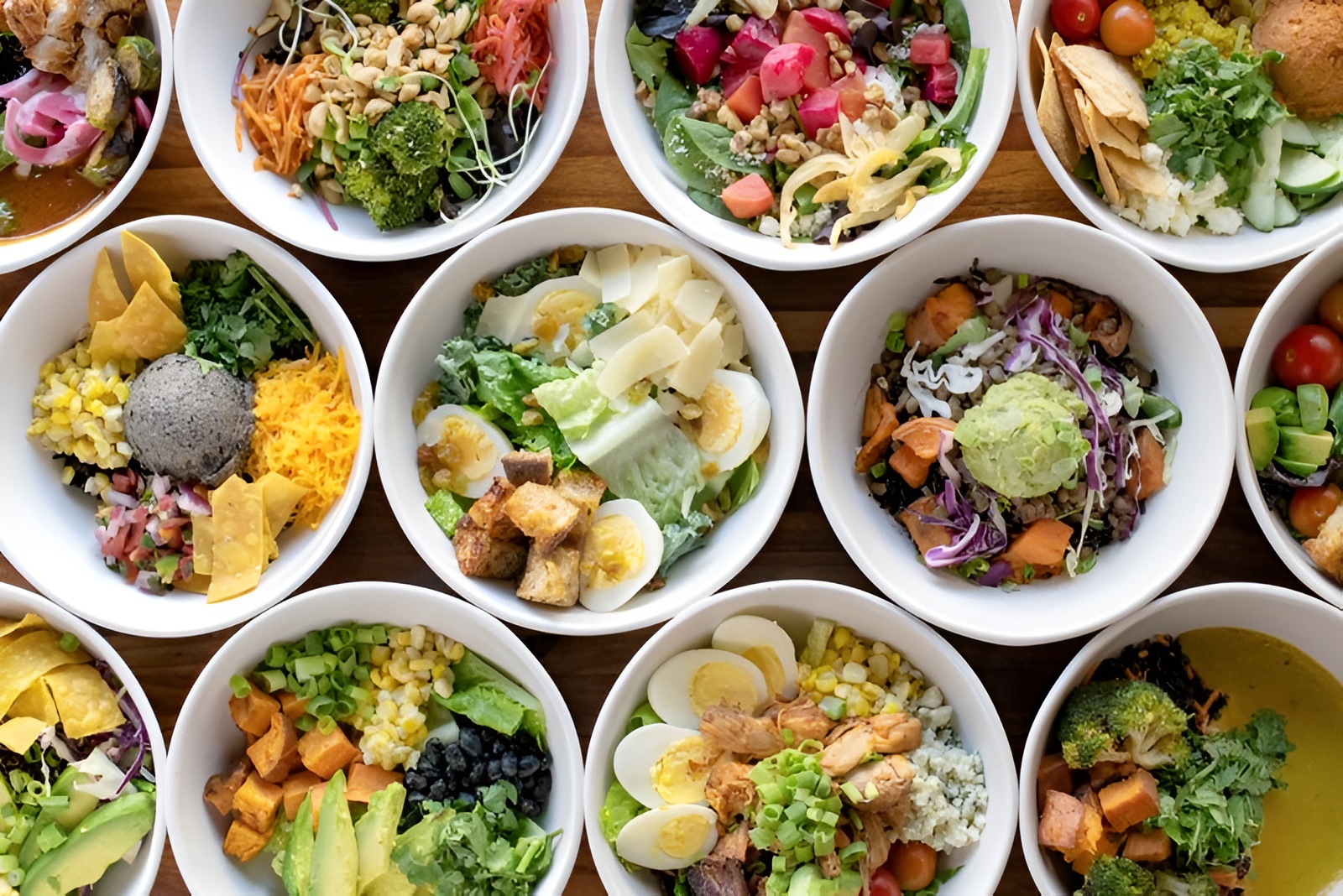 Various Forage Kitchen’s budget-friendly healthy bowls, including options under $12.