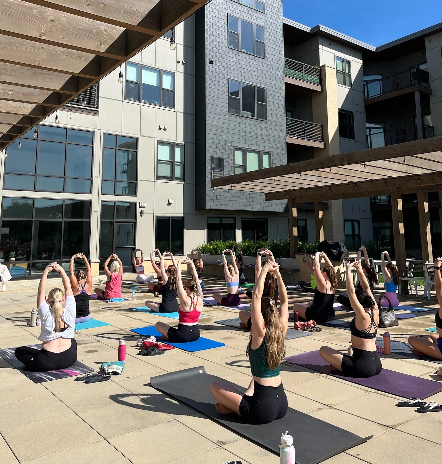 An outdoor yoga class sponsored by Forage Kitchen.