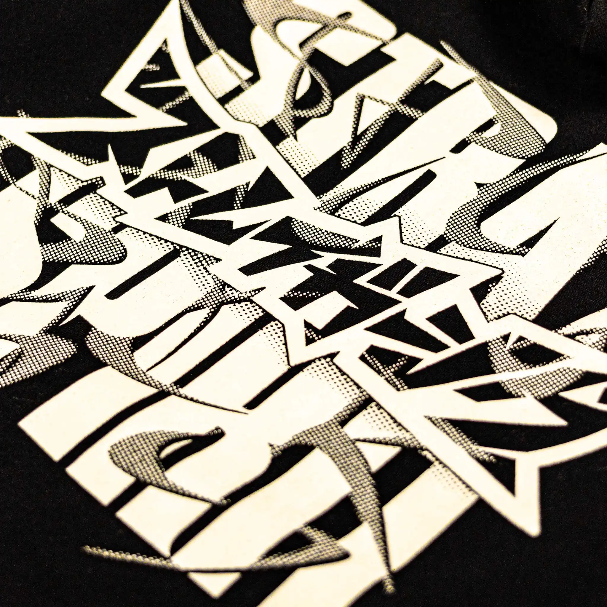 Straygang Spirit Hoodie in black, close-up of back print with oversized white Japanese graffiti-styled lettering.
