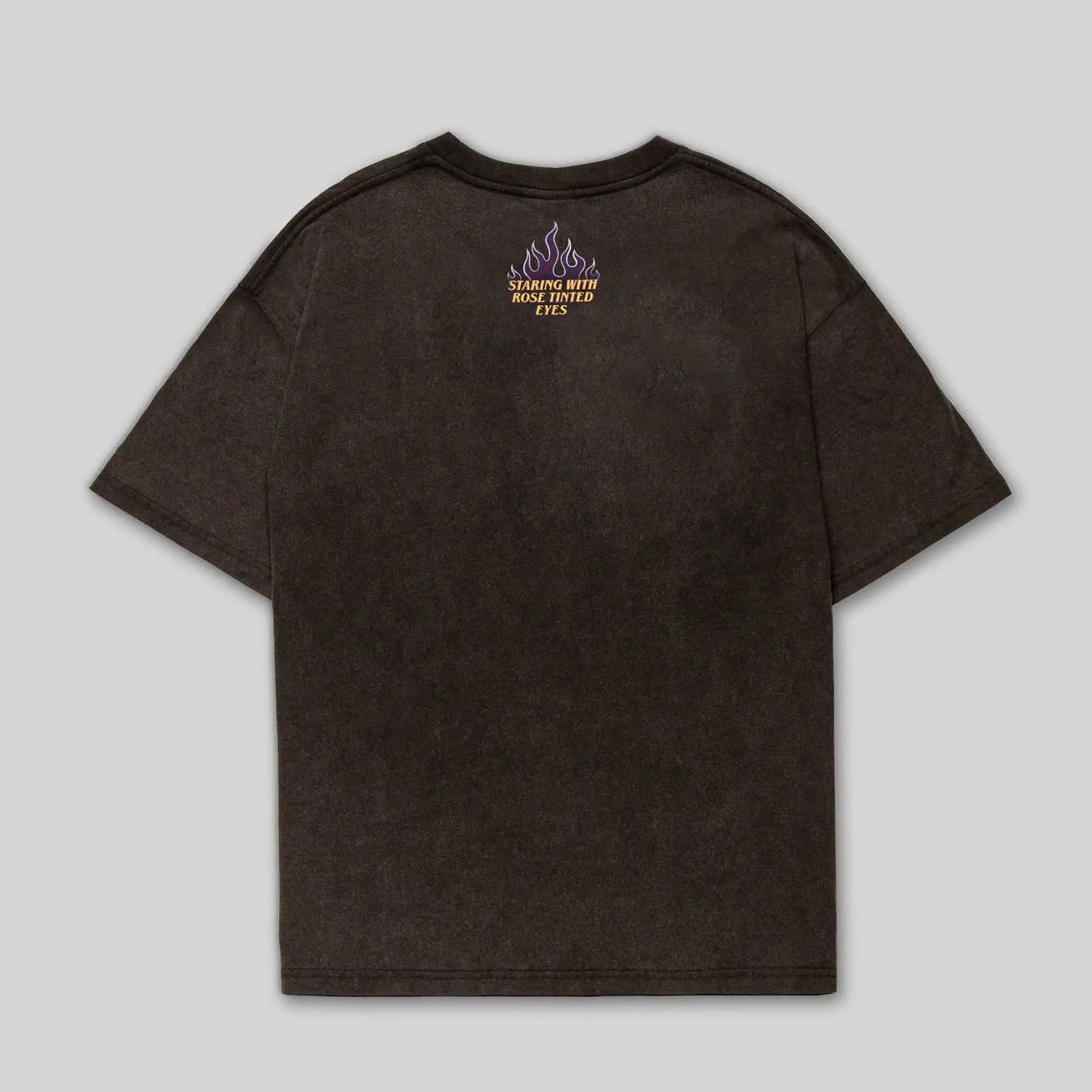Flat image of the back of Straygang's black wash t-shirt, featuring a small digital print with the words 'Staring with rose-tinted eyes' enveloped by flames. This view offers a complete look at the design and how it integrates with the tee's overall aesthetic.
