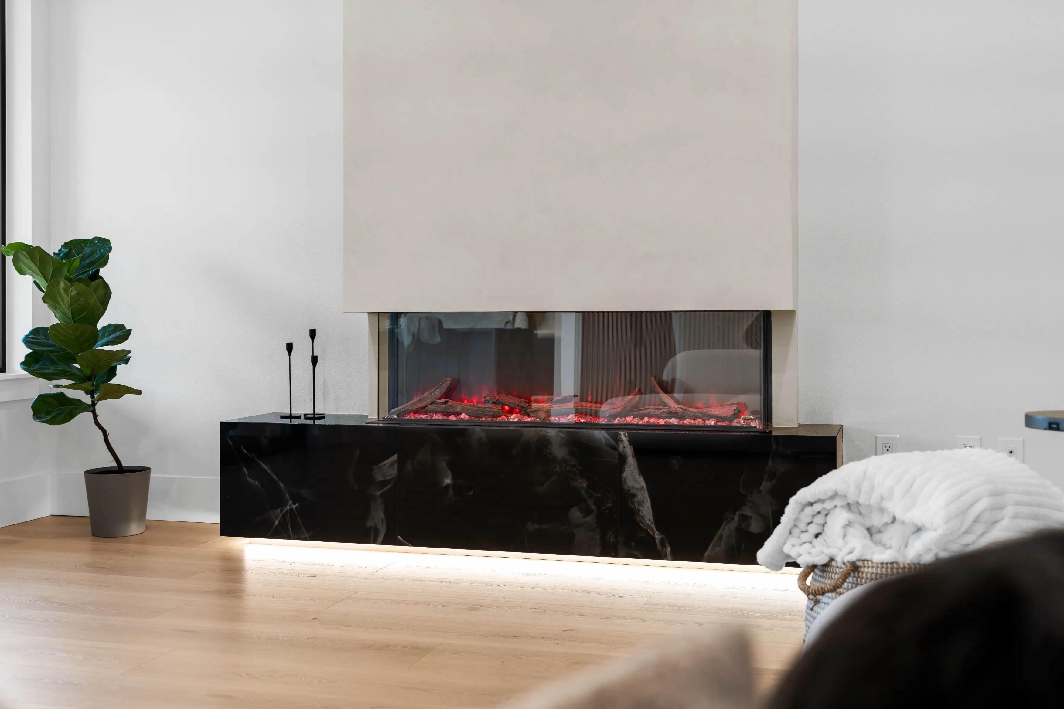 Contemporary custom home interior in Issaquah highlighting an open staircase, modern finishes, and spacious living area.