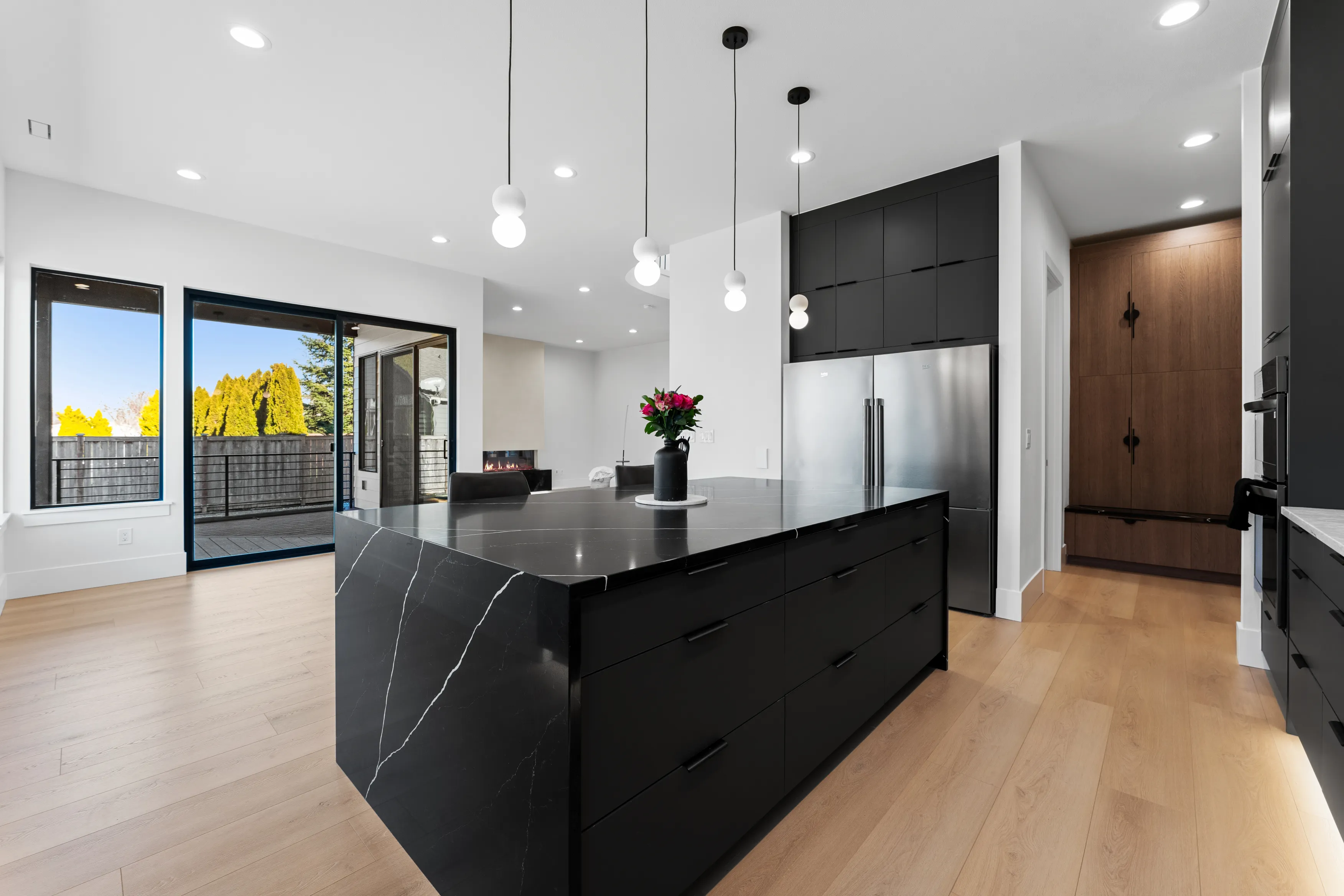 Custom-built modern kitchen in Issaquah with sleek finishes, spacious island, and functional open-concept layout.