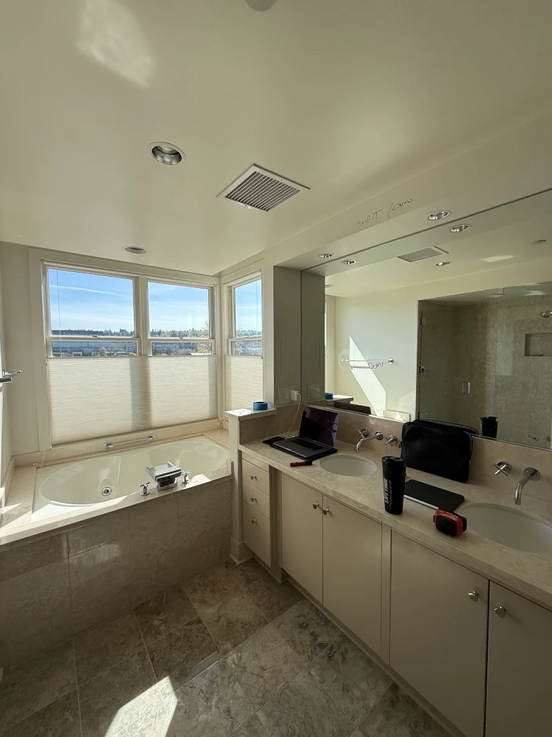Bathroom before renovation in downtown Kirkland condo.