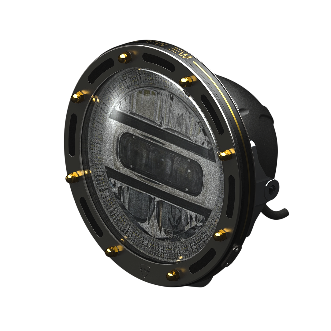 Close-up view of a round, black industrial light fixture with a glass cover secured by eight gold-toned bolts, showing an LED inside and a side mounting bracket with a cable.