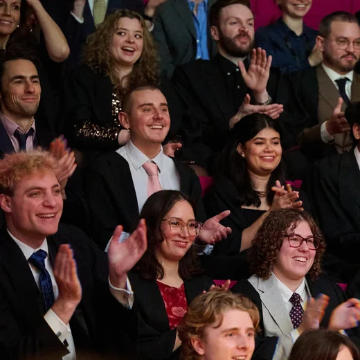 Redesigning the MBA for Modern Leadership and Infrastructure Silhouette of a person overlaid with power lines and sunset, representing the transformation of modern MBA programmes to address complex global systems