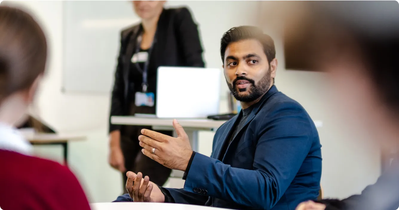 Waqās Ahmed wearing his blu suite